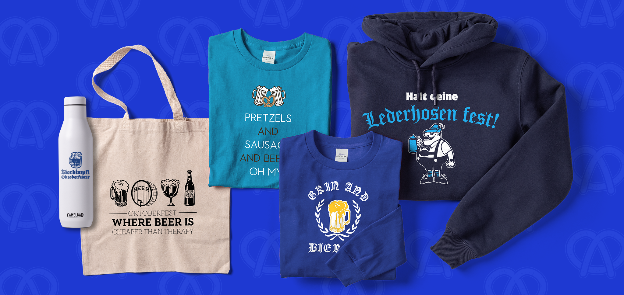 A water bottle, tote bag, t-shirts, and hoodie with Oktoberfest sayings printed on them. 