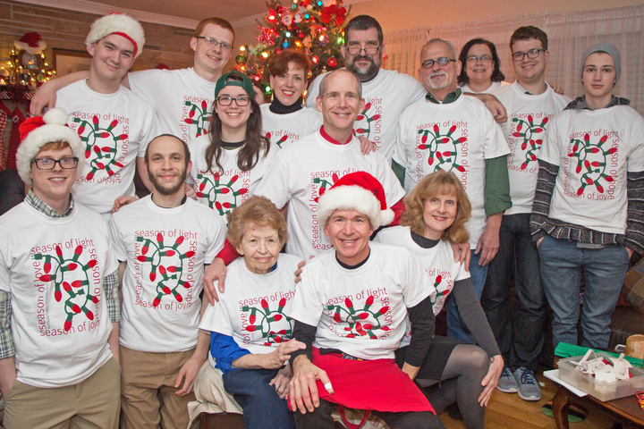 a family celebrates in custom shirts for christmas