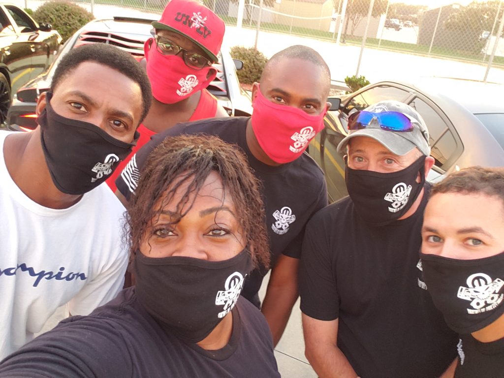 Mopars of Fayetteville club members taking a selfie in their masks