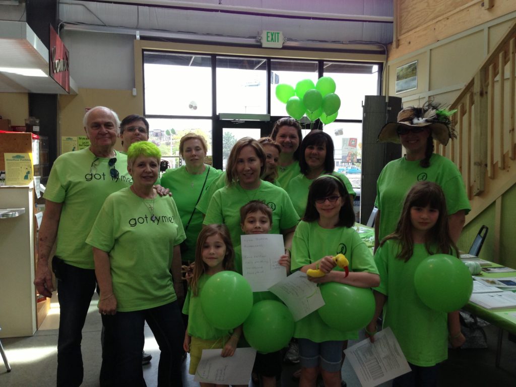 Group of people wearing matching green Lyme Disease shirts