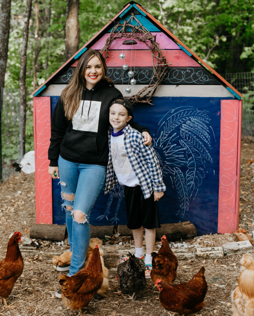 Mother and son wearing matching custom shirts with chickens