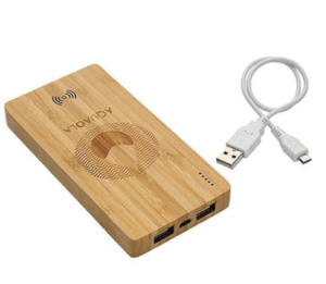 The Laser Engraved Plank 5,000 mAh Bamboo Wireless Power Bank has an elegantly engraved logo and comes with a white power cord.