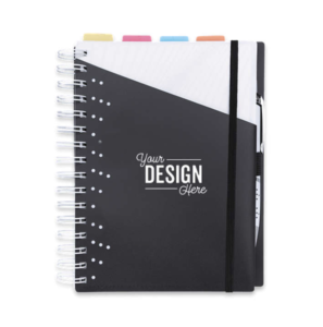 A spiral-bound notebook with colored tabs for easier organization and a pen attached for ease of access.