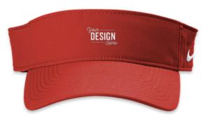A Nike Dri-FIT Team Performance Visor in University Red with "Your Design Here" printed on the front above the bill. The Nike "swoosh" is on the lefthand side. 
