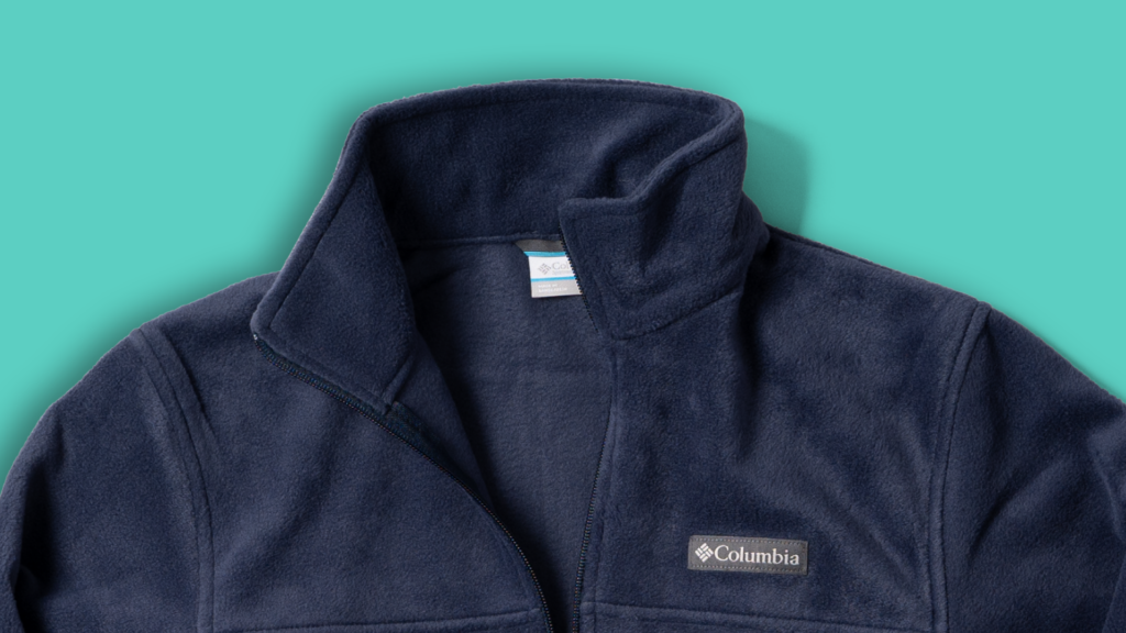 A close-up of a navy Columbia Steens Mountain Full Zip Fleece Jacket from the shoulders up. 