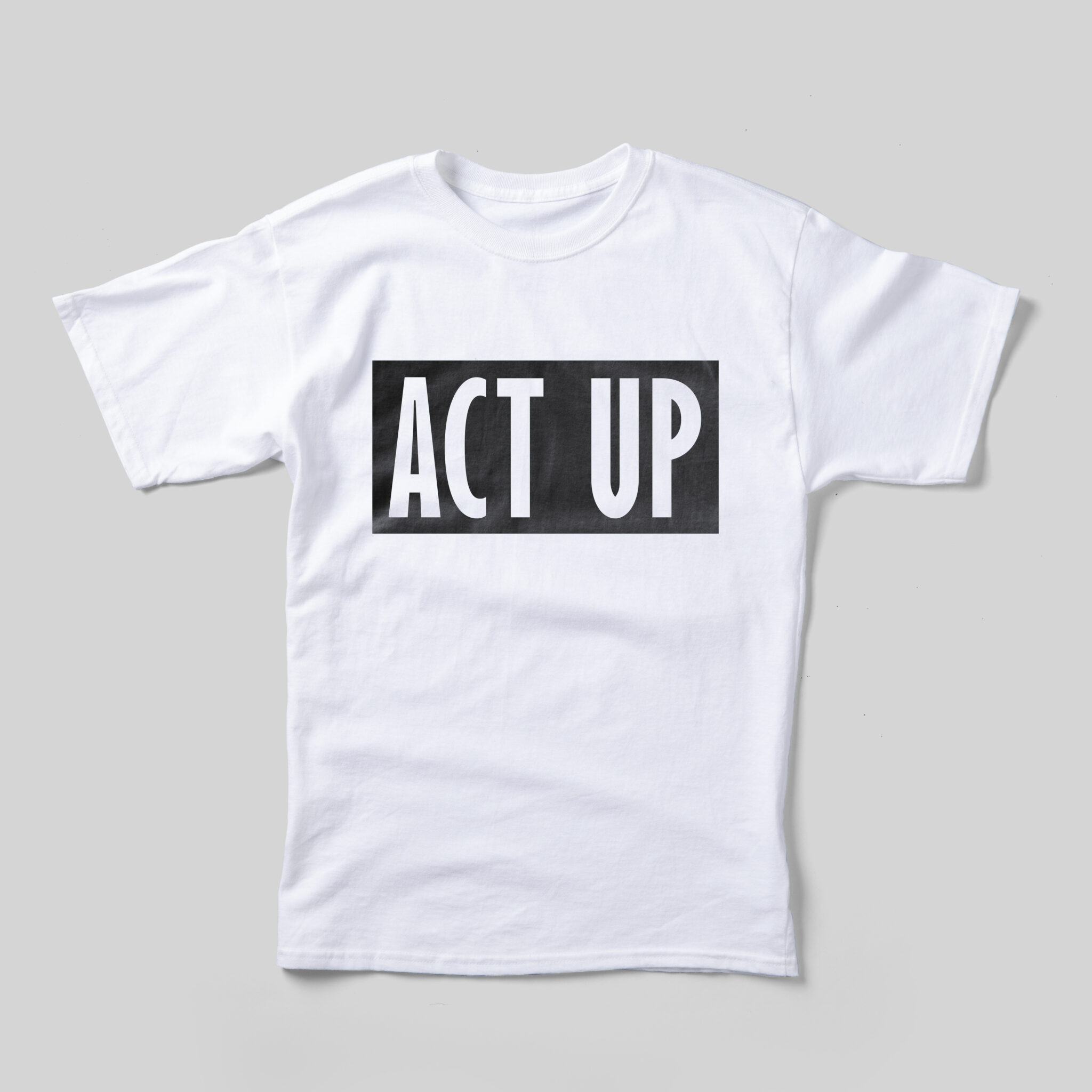 A white t-shirt with the ACT UP logo, which reads "ACT UP" in white, inside of a black box.