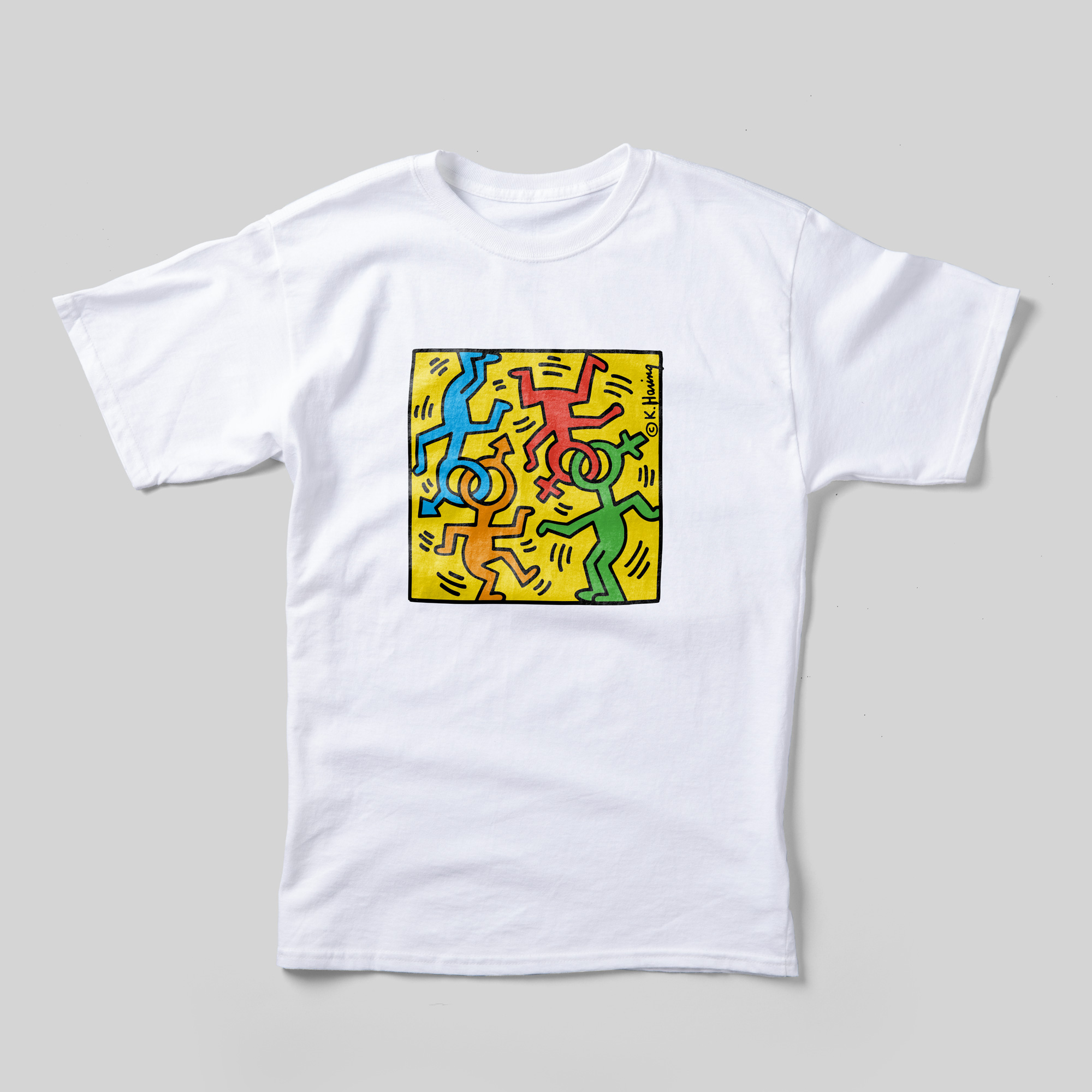 A white t-shirt with Keith Haring's Heritage of Pride artwork on the front.
