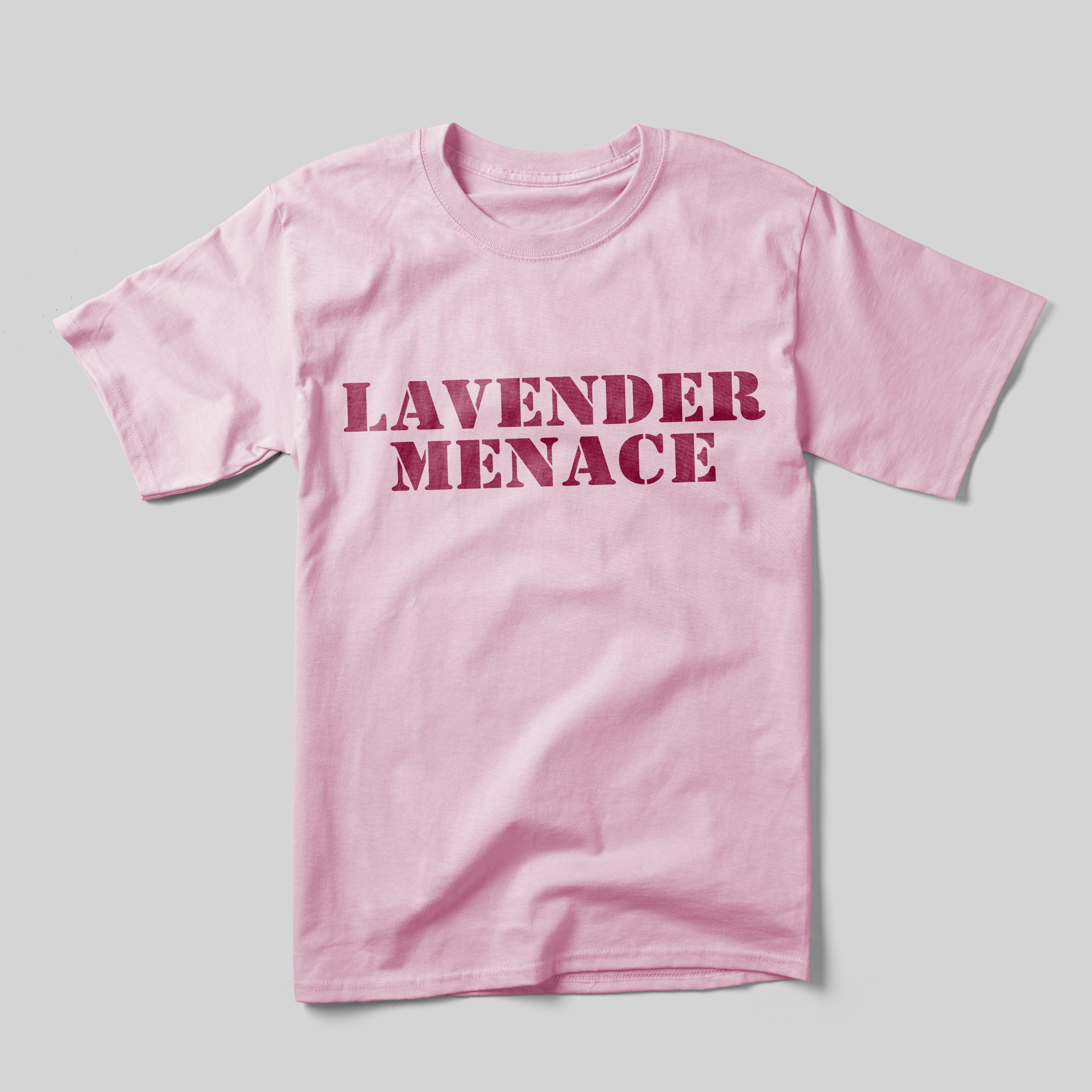 A pink t-shirt that reads "Lavender Menace" in red text.