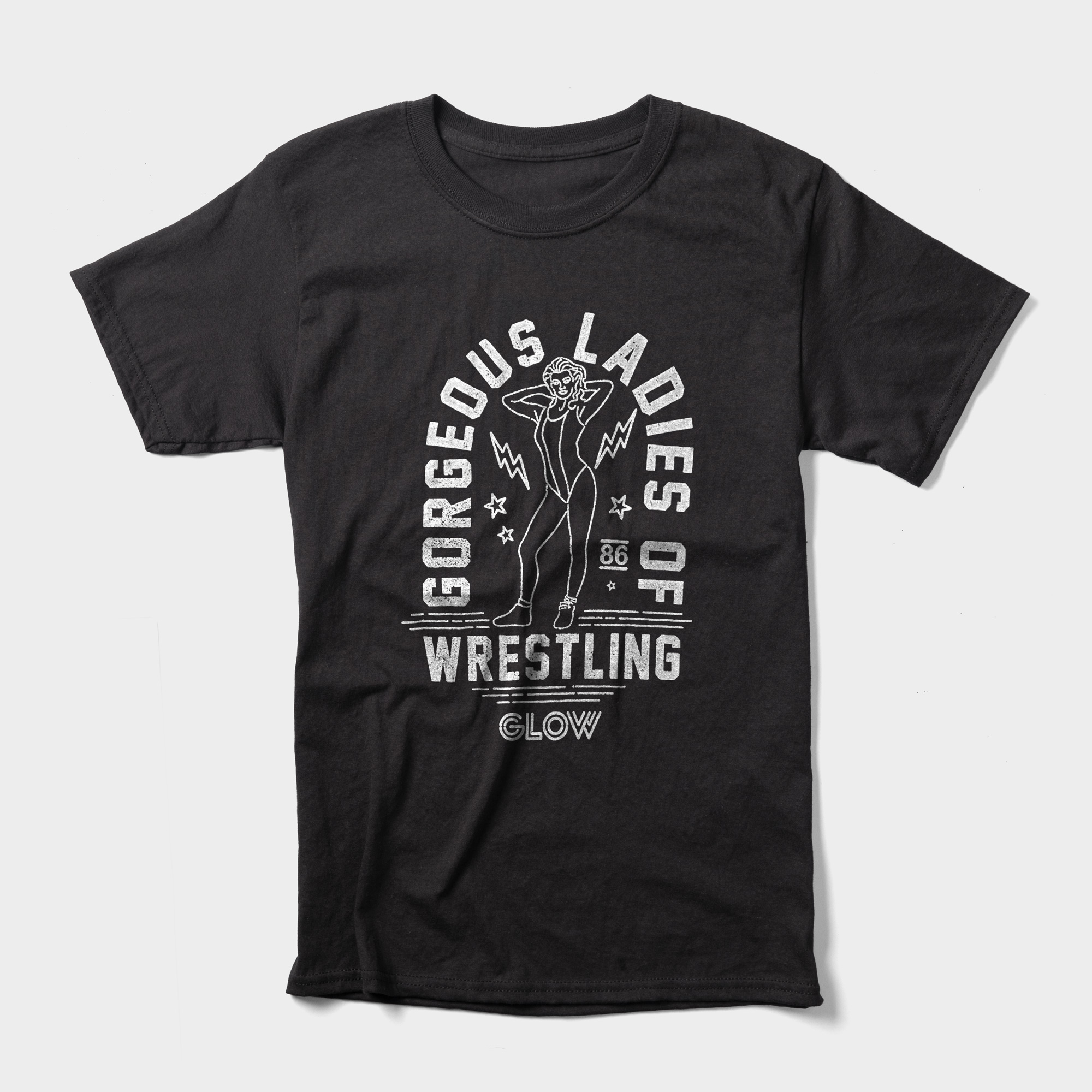 The Gorgeous Ladies of Wrestling shirt features their logo and an illustration of a strong female wrestler. 