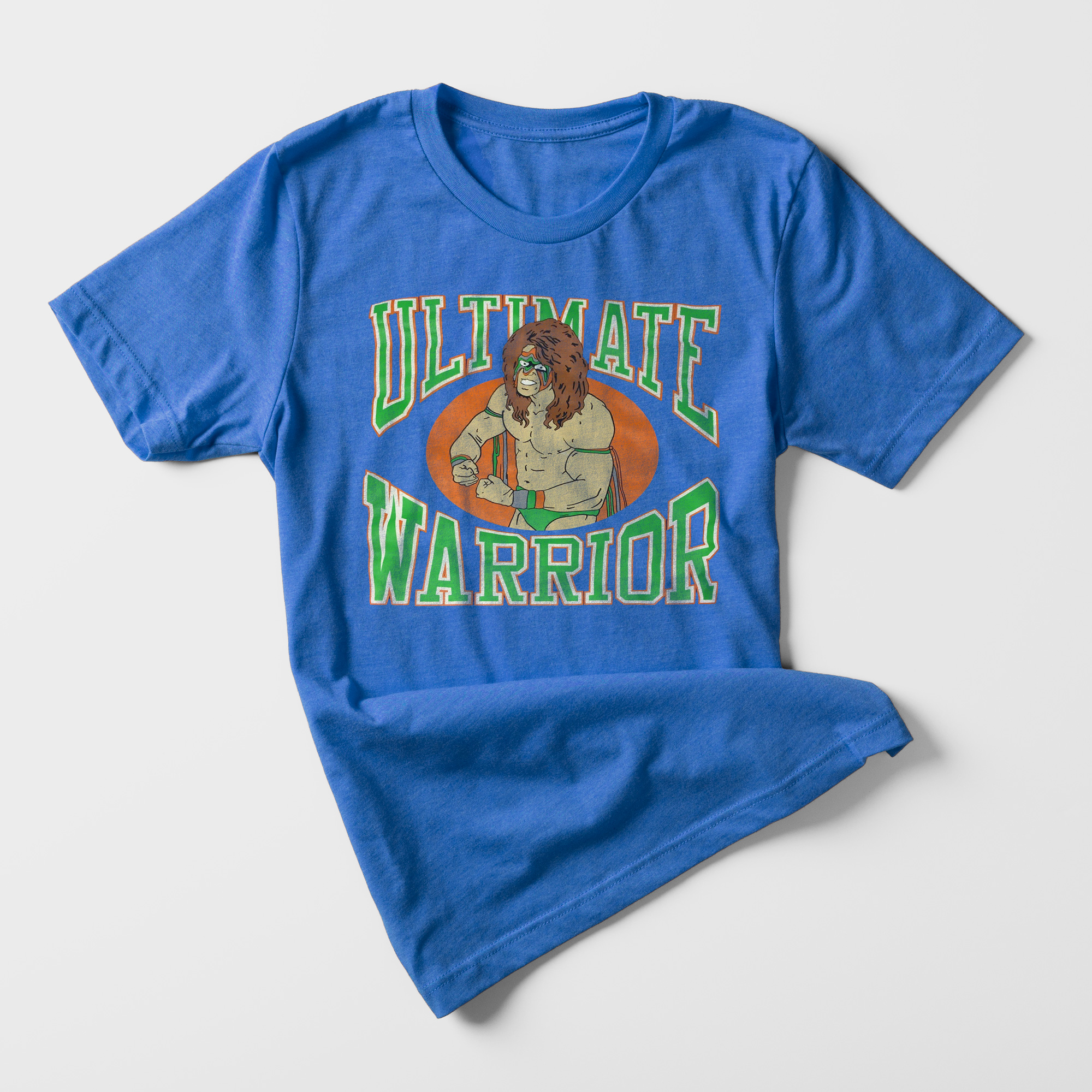 The Ultimate Warrior's t-shirt has a vintage feel and its blue fabric along with the vibrant illustration of the wrestler exemplifies his image. 
