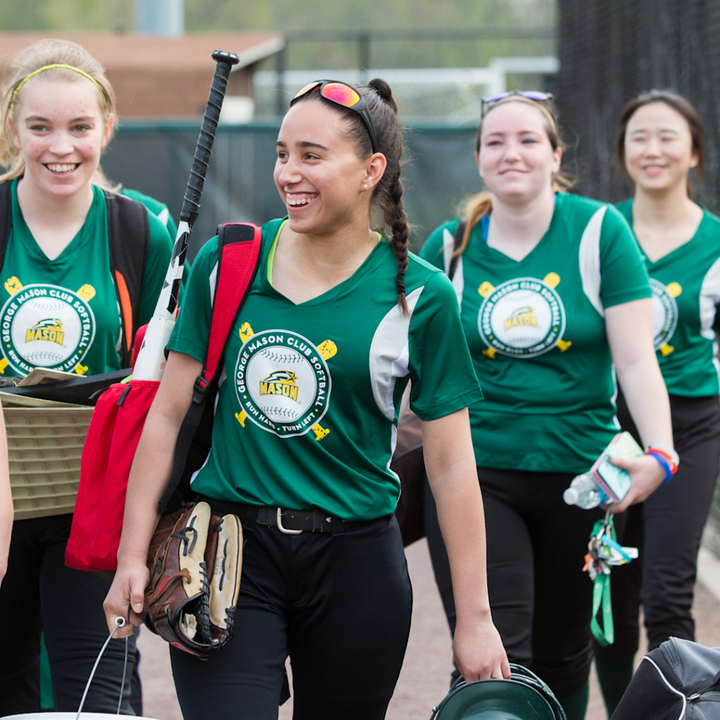 women wearing Custom softball jersey with team design from Custom Ink