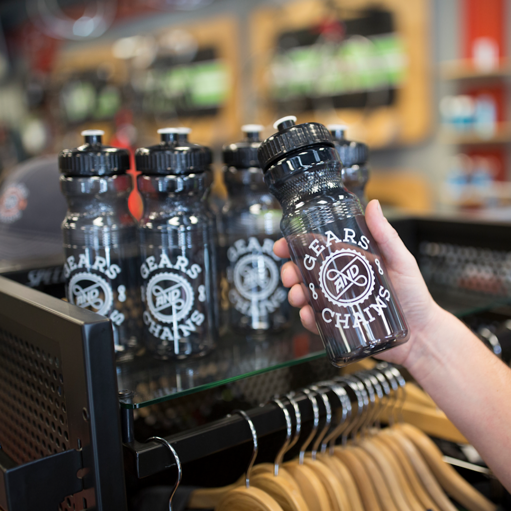 bike shop using branded water bottles for marketing